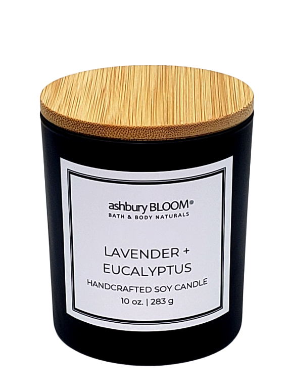 Lavender Eucalyptus Soy Wax Candle - A beautifully crafted soy wax candle by ashbury BLOOM in a glass jar, emitting a warm and inviting glow. The candle is made from natural soy wax, offering a clean and long-lasting burn. It features a delicate fragrance of fresh aroma of lavender and invigorating scent of eucalyptus, perfect for creating a cozy atmosphere in any room