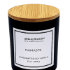 Namaste Soy Wax Candle - A beautifully crafted soy wax candle by ashbury BLOOM in a glass jar, emitting a warm and inviting glow. The candle is made from natural soy wax, offering a clean and long-lasting burn. It features a delicate fragrance of intoxicating fragrance, which combines the fresh scent of pomegranate with the delicate notes of red poppies and amber, perfect for creating a cozy atmosphere in any room