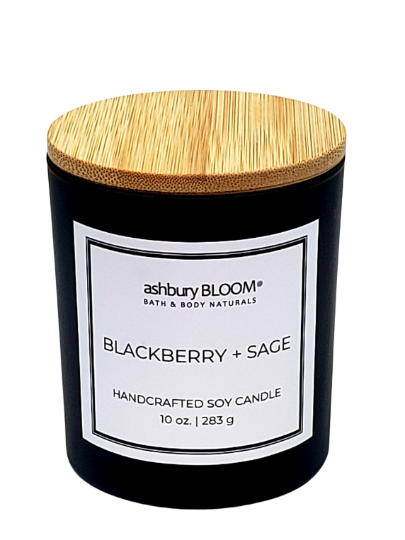 Blackberry Sage Soy Wax Candle - A beautifully crafted soy wax candle by ashbury BLOOM in a glass jar, emitting a warm and inviting glow. The candle is made from natural soy wax, offering a clean and long-lasting burn. It features a delicate fragrance of plump blackberries and earthy aroma of crushed sage, perfect for creating a cozy atmosphere in any room.