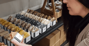 Vira, the owner of Ashbury Bloom, Mount Hope, Hamilton, Ontario Canada holding a handmade, natural soap bar - Ashbury Bloom Pink Clay Handmade Soap