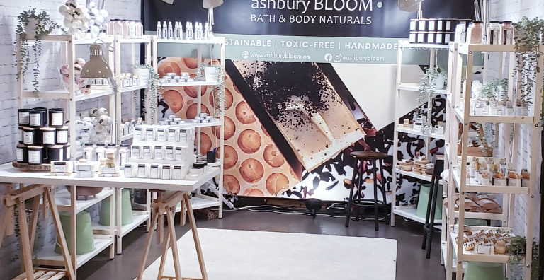 Boutique display of Ashbury Bloom products on shelving, showcasing curated wholesale items and bath & body collections.